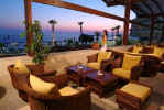 Relax and enjoy the a cool drink with lovely views of the clear sky and blue sea