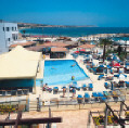 Limanaki Beach Hotel in Agianapa, Cyprus, Click to enlarge this photograph of the Swimming Pool and Beach in the background