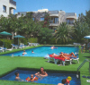 Stavros Hotel Apartments in the Dekelia Tourist Area of Larnaka Town in Cyprus, relax by the swimming pool or on the sandy beach just across the road, click to enlarge this photograph